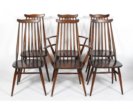 A set of six 20th century vintage Ercol 'Goldsmith' dining chairs, including two carvers, all having a tall spindle backrest 