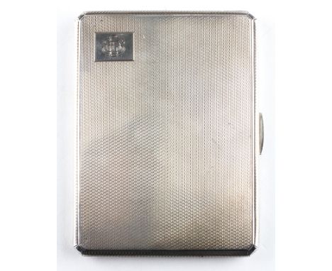 An Art Deco silver cigarette case of rectangular form, the outer adorned with engine turned detailing, the interior being gil