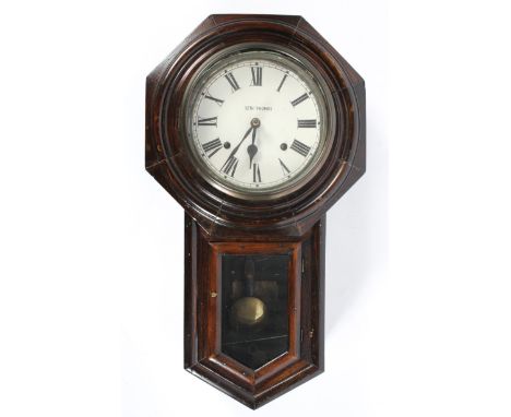 Seth Thomas (American) wall clock, within stained oak moulded octagonal case, with painted white metal dial named for Seth Th