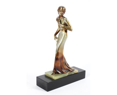 An Art Deco style sculpture of a lady, on green onyx and black slate base, 27 cm high 