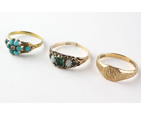 A collection of three rings to include a turquoise daisy cluster, an opal and emerald half hoop and an engraved signet ring (