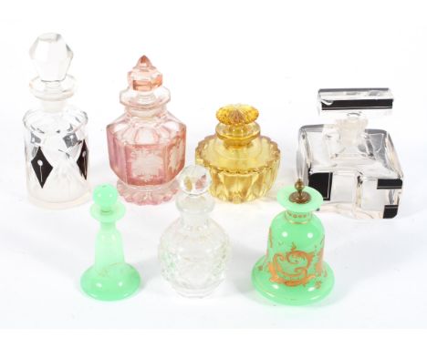A collection of vintage scent bottles, including Art Deco examples in black and frosted glass, 11.5 cm high, two Bohemian gre