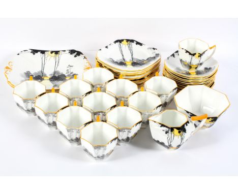 A Shelley Art Deco 'Sunrise &amp; Tall Tree' Queen Anne shape part tea service for twelve, comprising : 12 teacups and saucer