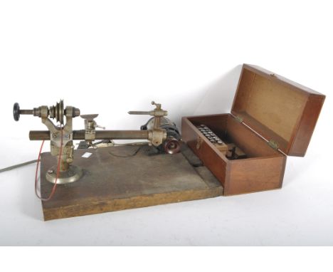 A Clock and Watchmaker's lathe by Wolf-Jahn &amp; Co, Frankfurt, mounted with a Universal Motor (British Made), a wooden box 