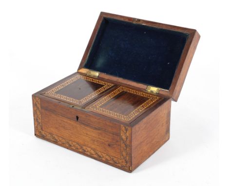 A Tonbridgeware tea caddy, late 19th century, the geometric top enclosing a twin canister interior, 11.5cm high, 21cm wide, 1