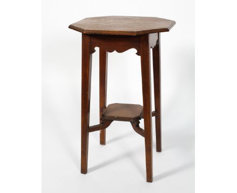 An oak Arts and Crafts table occasional table, the octagonal top on four legs with a shelf stretcher, 79cm high, 50cm wide, 5