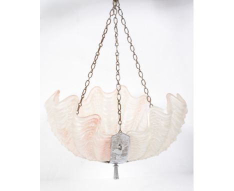 An art deco style moulded and frosted glass ceiling light, with remains of pink tinting, of shell form, in three sections, wi