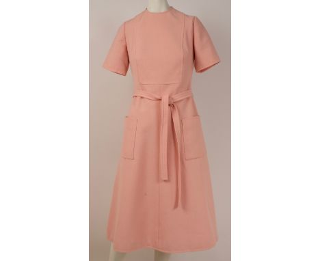 A 1960'S COUTURE 'DIORLING' A-LINE DRESSShell pink, crepe wool with sateen lining. Square pockets on the front, Angular desig