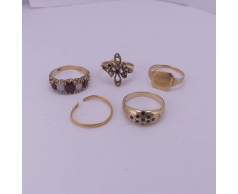 A graduated opal and garnet five stone Ring, mounted in 9ct yellow gold, Size P, together with a 9ct yellow gold band, the fl