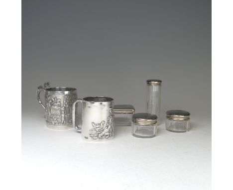 An early 20thC Eastern silver Mug, possibly Chinese / Burmese, the base marked 'T.P. 90', with continuous scene decoration of