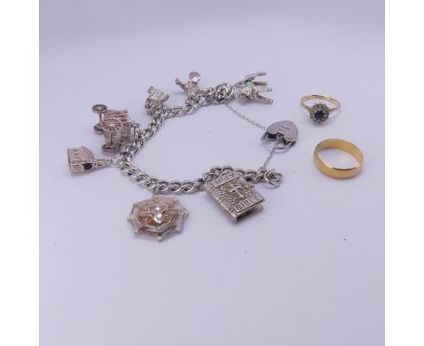 A 22ct yellow gold Band,&nbsp;Size O, 3.2g, together with a small sapphire and diamond cluster ring, mounted in 18ct yellow g