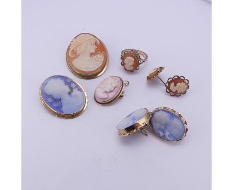 A quantity of shell Cameos; including a pair of 14ct gold mounted ear studs, two 18ct gold mounted pendant / brooches, a 9ct 