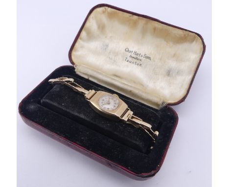 A vintage 9ct gold lady's Avia Wristwatch, with 15-jewels movement, on an expanding 9ct gold bracelet strap, gross total weig