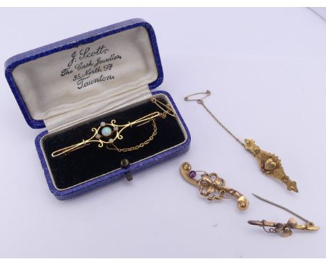 A cased 15ct yellow gold and opal Bar Brooch, with metal pin reverse, 6cm long, total weight 4.5g, together with another with