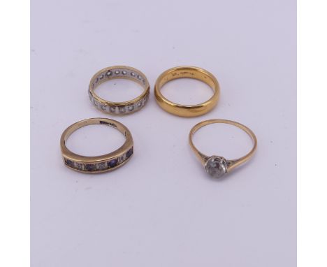 A 22ct yellow gold Band, 4.2mm wide, Size L, 6.3g, together with an 18ct yellow and white gold white paste eternity ring, Siz