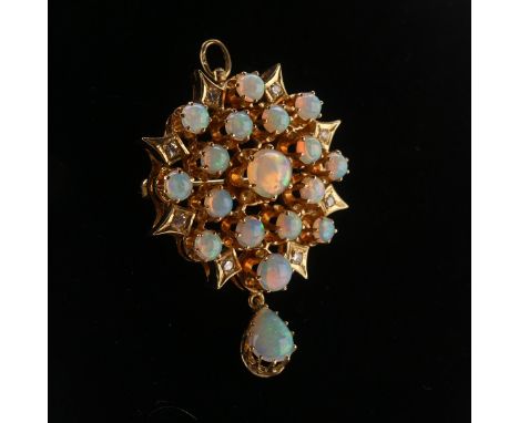 An antique style opal and diamond Pendant / Brooch, the starburst cluster set seventeen circular cabochon crystal opals, the 