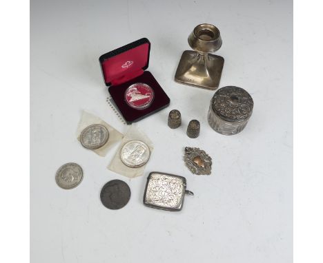 A cased silver (500) Royal Canadian Mint Dollar, commemorating the centenary of the City of Vancouver, together with two silv