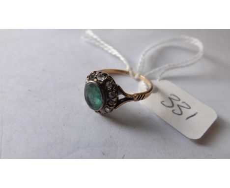 Gold and green stone diamond cluster ring  approx size M        