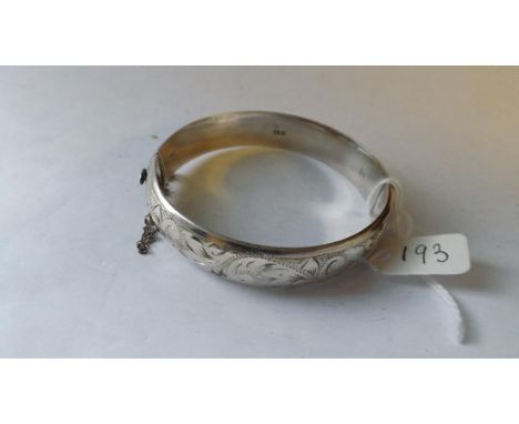 Vintage silver chased top hollow bangle.     