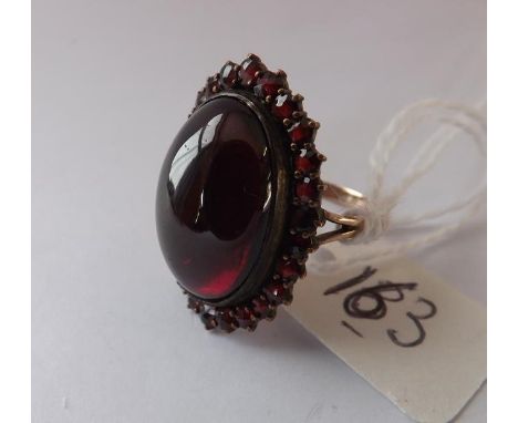 19thc large oval cabochon garnet ring  approx size P        