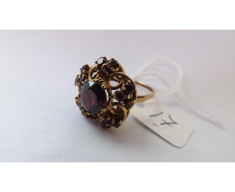 Large 9ct garnet flowerhead ring approx size V 7g inc  