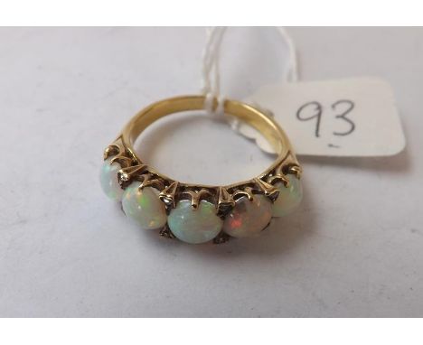 GOLD MOUNTED FIVE STONE OPAL  half hoop ring set with diamond points  approx size Q  5.9g inc      