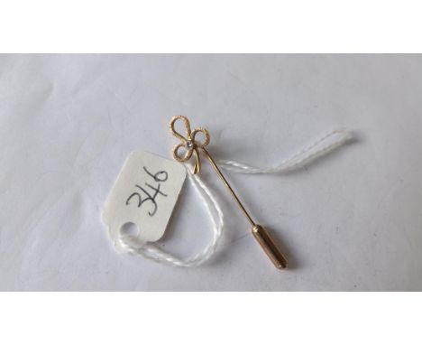 Gold diamond set stick pin      