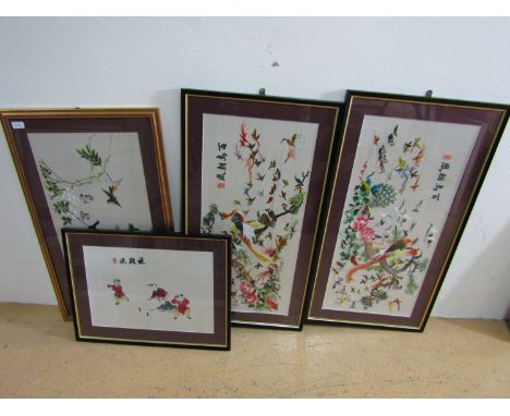 Four vintage oriental embroidered silks depicting exotic birds and children