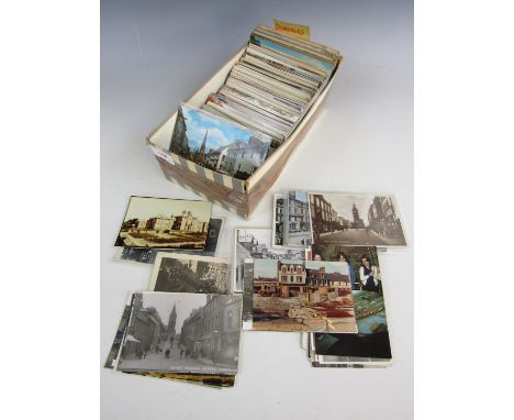 A quantity of vintage postcards depicting Dumfries, Scotland