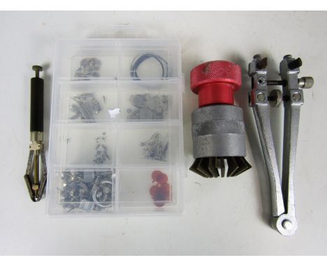 A quantity of sundry watchmakers tools and spares