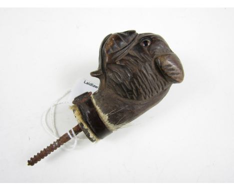 A novelty wooden hounds head walking stick pommel
