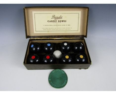 A boxed set of Banda carpet bowls