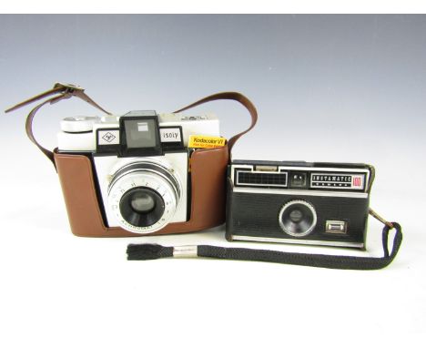A vintage Agfa Isoly camera together with an Instamatic 100