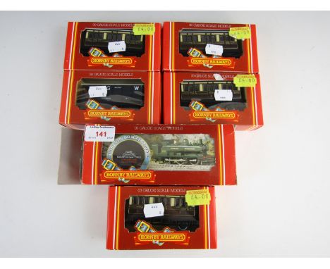 A boxed Hornby GWR Class 2721 Pannier tank locomotive together with four carriages and a brake van