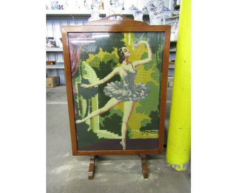 An embroidered fire screen depicting a ballet dancer