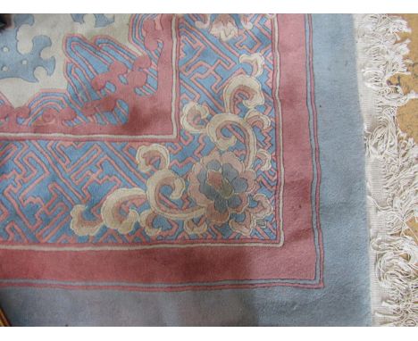 A light blue patterned 100% wool pile Chinese Imperial Jewel carpet