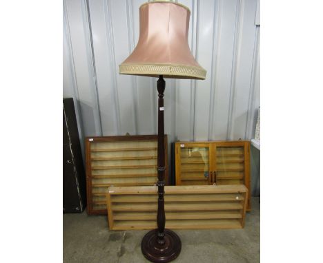 A mahogany standard lamp