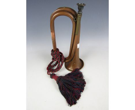 A bugle with tassels