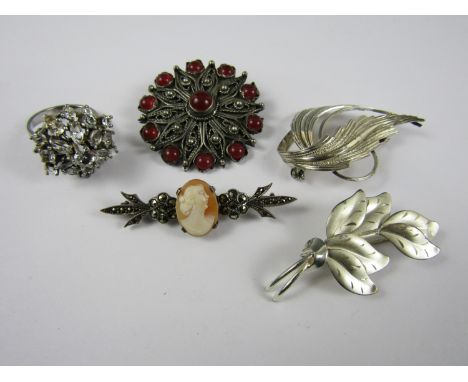 Vintage silver costume jewellery, including a Greek cabochon brooch, two contemporary foliage brooches, a marcasite and cameo