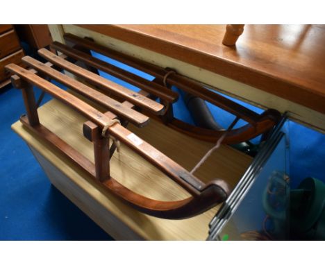 A vintage toboggan/sledge , impressed mark Davos