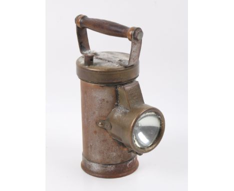 A c.1920's CEAG Ltd battery operated brass diver inspection lamp. H22cm