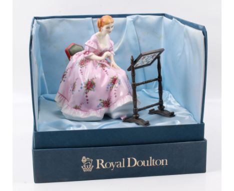 A Royal Doulton The Gentle Arts china figure. Tapestry Weaving No. 496, boxed with certificate. H17cm