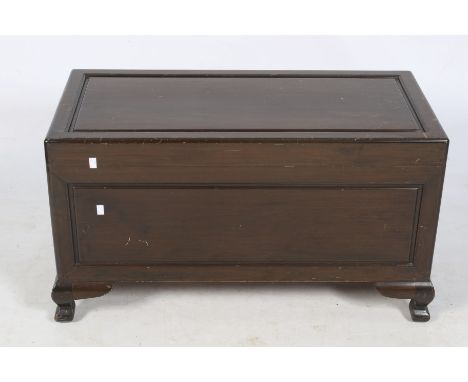 A camphor wood trunk. Having a panelled top and sides, raised on bracket feet, H52cm x W94cm x D45.5cm