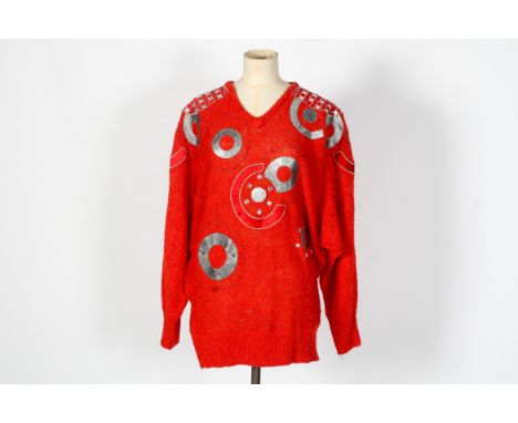 Two vintage woollen jumpers and a turquoise shift cotton blouse. The jumpers comprising a 1980s Bonnie Boerer jumper with gil