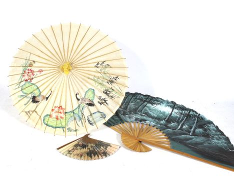 A group of three assorted fans. Including a large Asian painted fan, a parasol, and a small Chinese fan. The larger fan paint