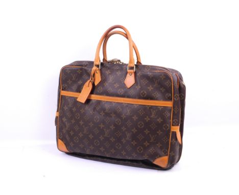 A vintage Louis Vuitton documents briefcase from the Porte Documents Voyage series. 1996, labelled 'NO0996'.  Monogram canvas