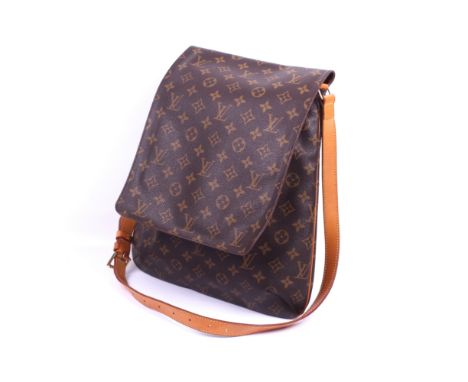 A vintage Louis Vuitton mussette bag. 1997, labelled 'SD0979'. Monogram canvas with a cow hide leather adjustable shoulder ca
