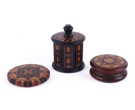Three Tunbridge ware needlework tools. Comprising a cotton reel box with a circular lid and octagonal sides, H5.2cm, a circul