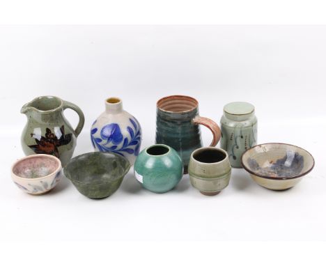 A selection of assorted studio art pottery items. Including a David Leach lidded pot, a tea bowl by John Jelfs, a green carve