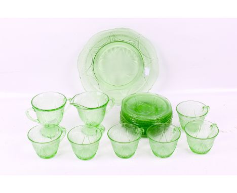 A set for six mid-century uranium pressed glass tea set. With jug, sugar bowl and sandwich plate, etc. Max. H11cm